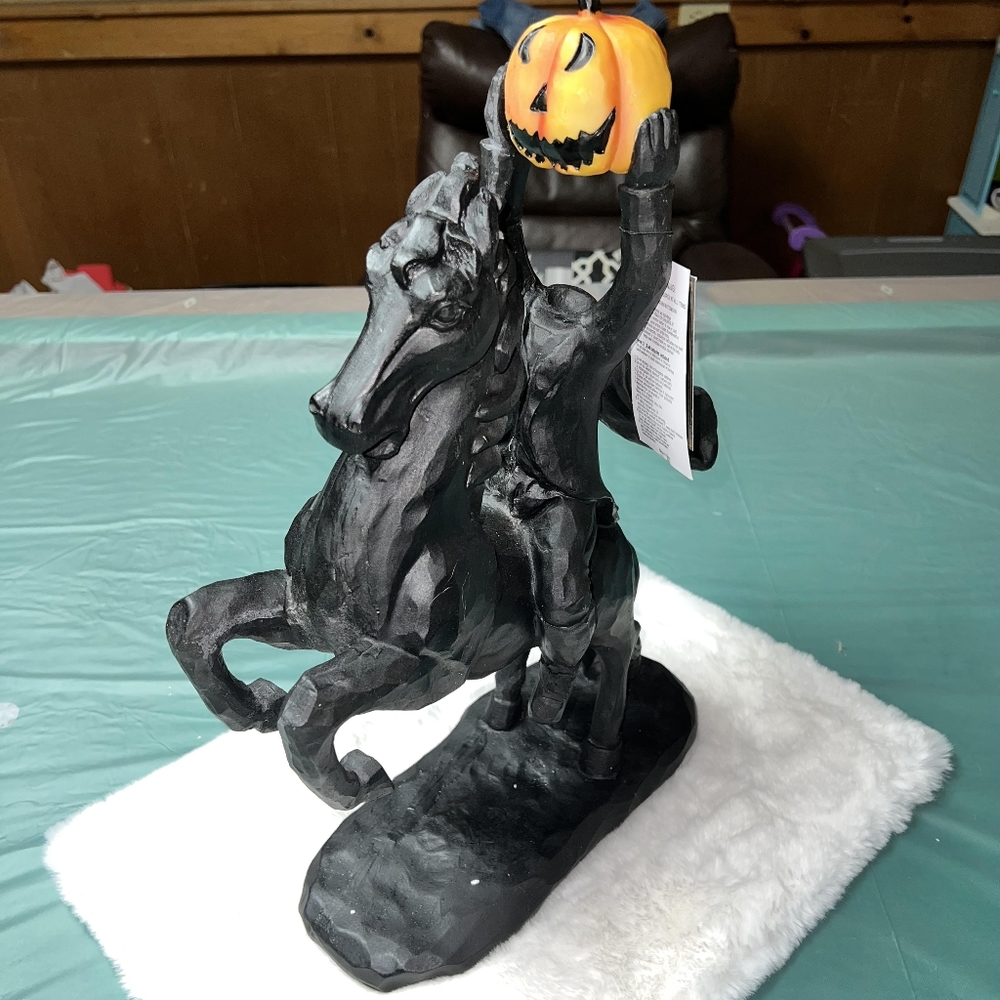 Spooky Night Halloween Headless Horseman Statue.